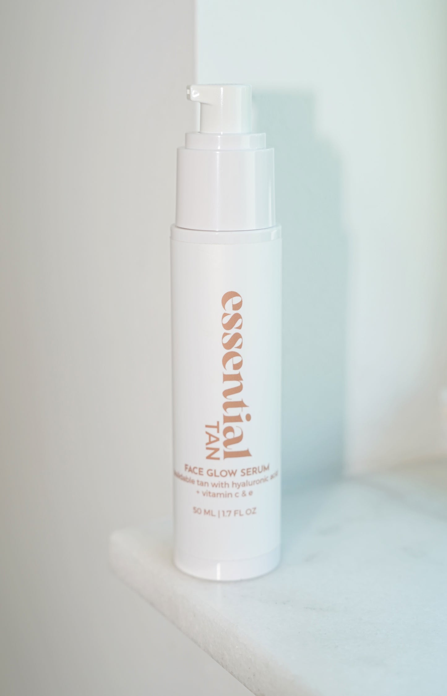 essential tan face glow serum